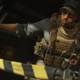 A Call of Duty soldier seemingly prepares to jump outta some cargo door.
